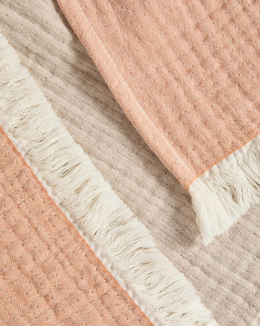 Coperta Nafine in garza di cotone 100% con frange bicolore 130 x 170 cm