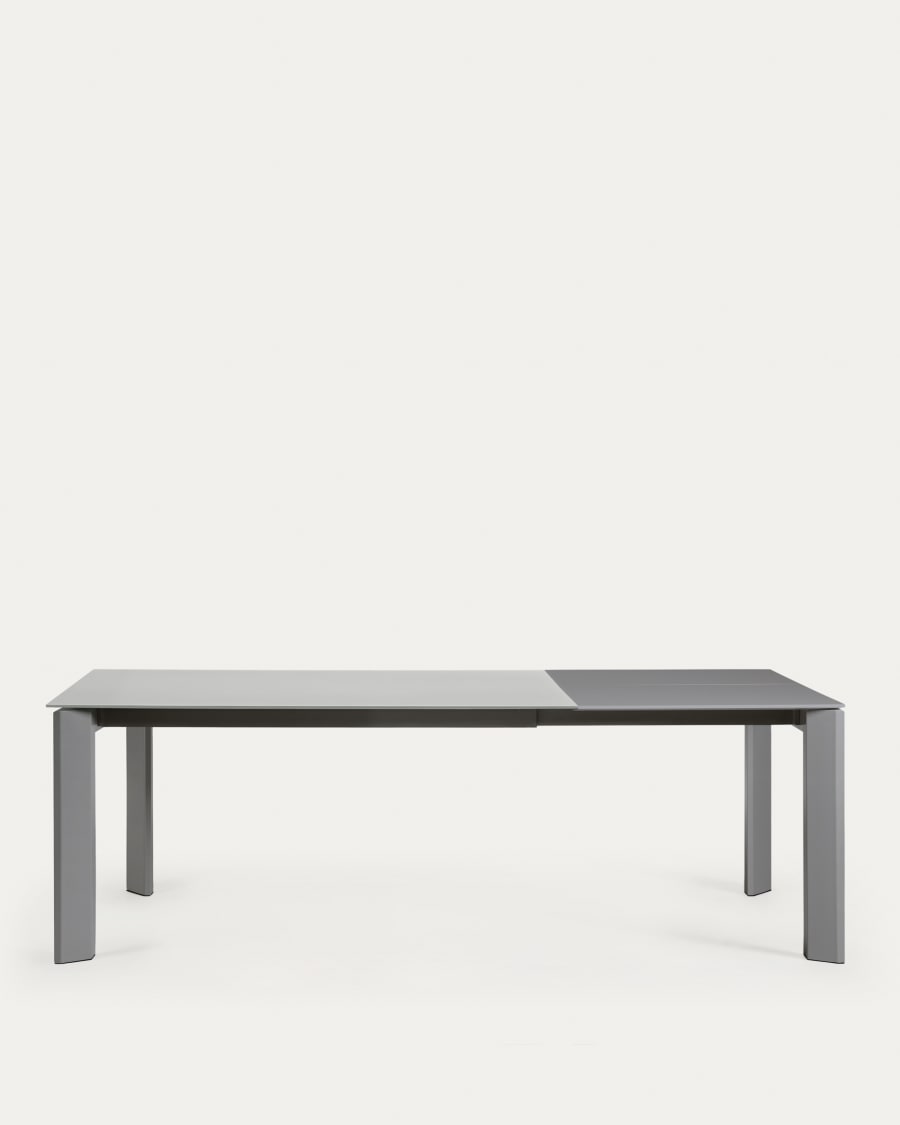 Axis extendable table in grey glass with steel legs in a dark grey finish, 160 (220) cm