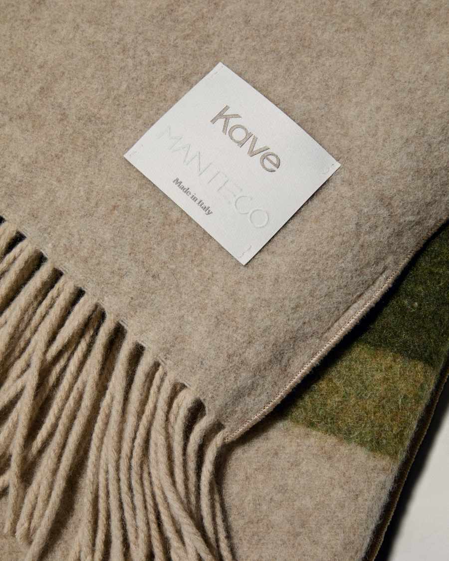 Voreni green recycled wool blanket with fringing 130 x 170cm