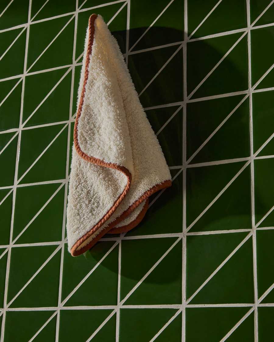 Sedora 100% cotton hand towel with orange contrast detail 30 x 50cm