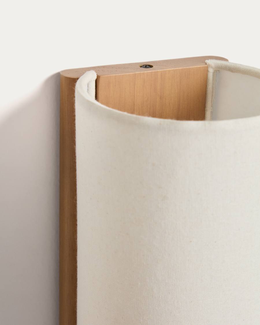 Umbran wall-mounted light fixture made from light brown rubberwood and beige linen