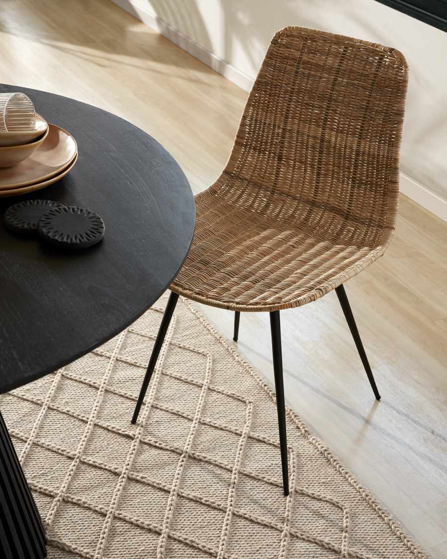 Equal chair made from rattan, with black finished steel legs