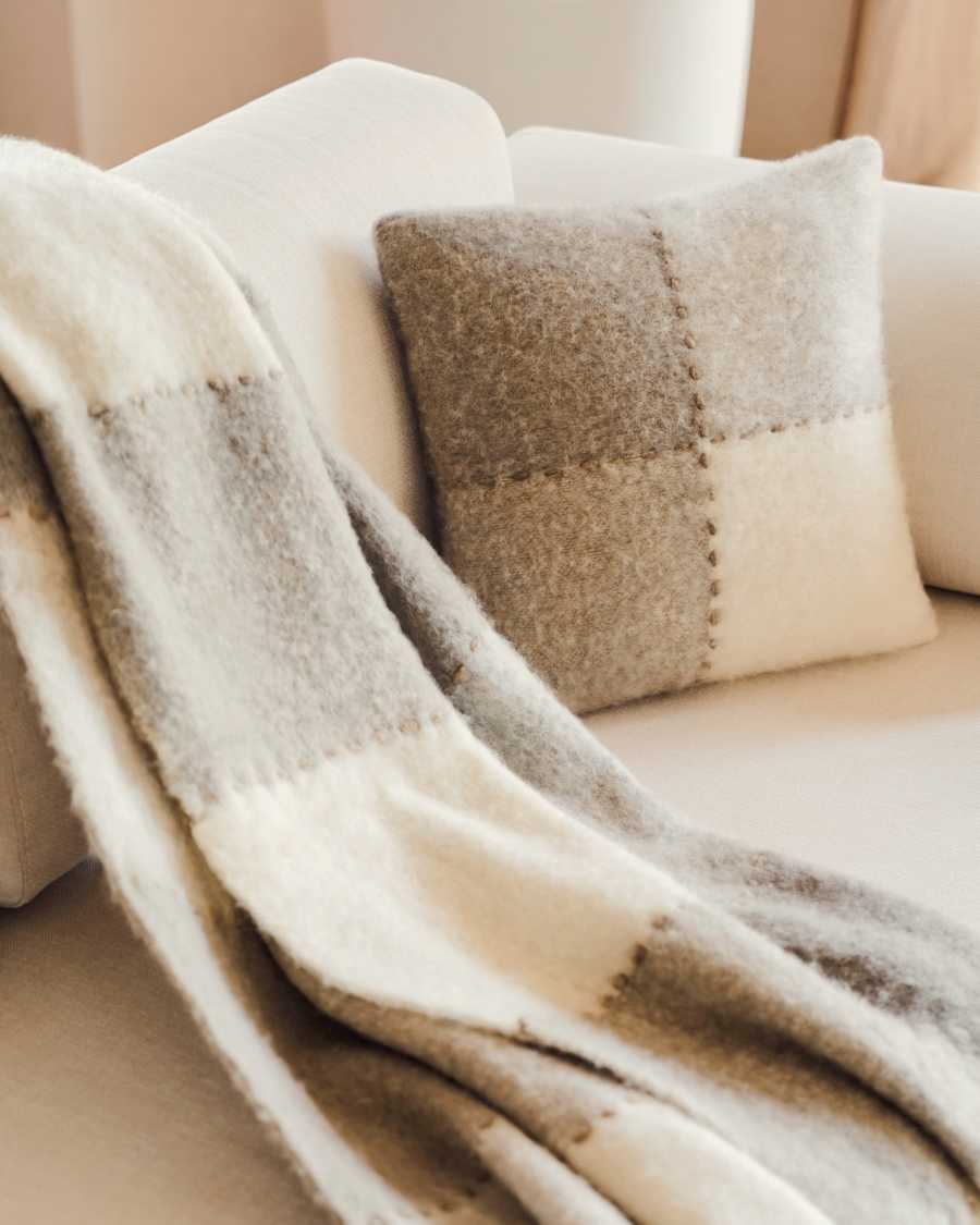 Munira check blanket with white and grey fringes and brown stitching 130 x 170 cm