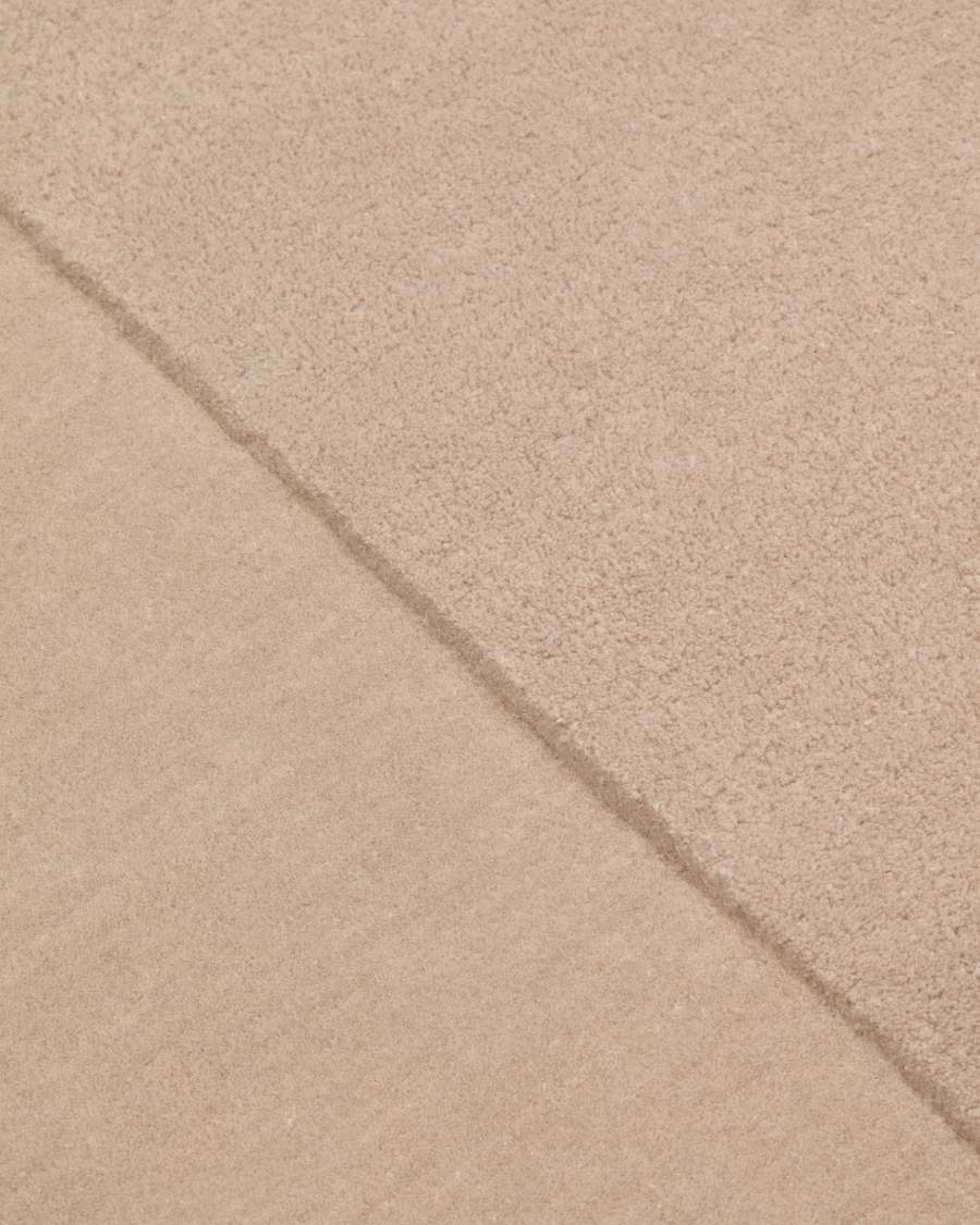 Tappeto ovale Cosima in lana beige Ø 160 x 230 cm