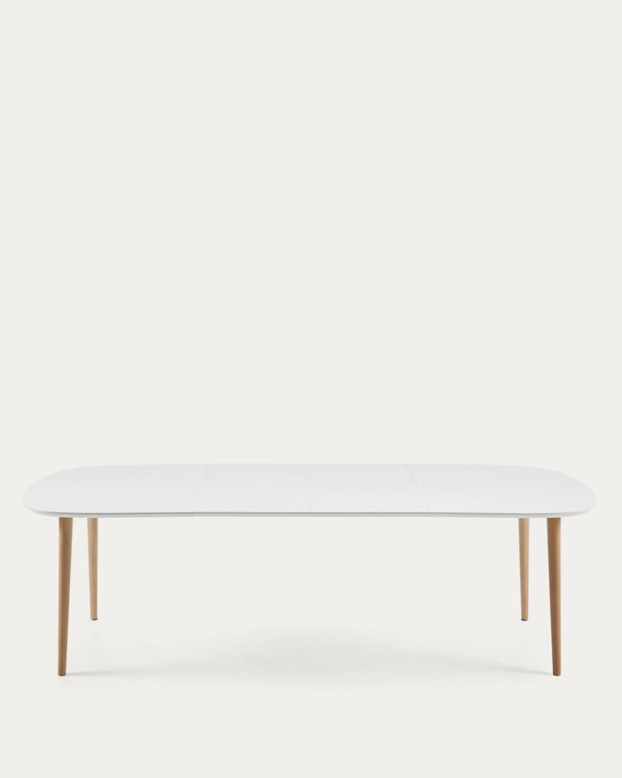 Oqui extendable oval table with an oak veneer and solid wood legs, Ø 160 (260) x 100 cm