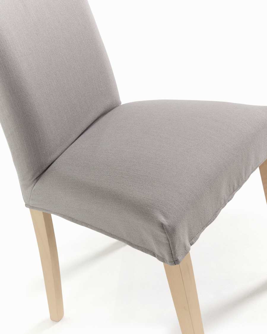 Light grey Freda chair with solid beech wood legs with natural finish