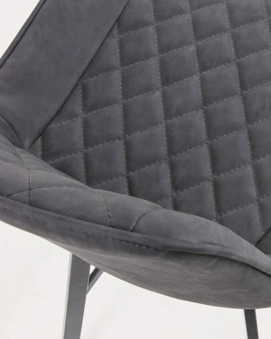 Adela faux leather stool in dark grey, with steel legs in a black finish, height 66 cm