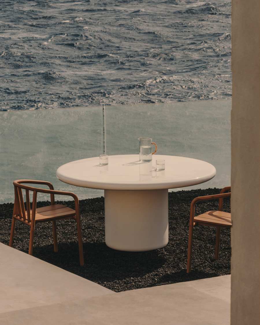 Canaret round cement table in a glossy white finish Ø 152 cm