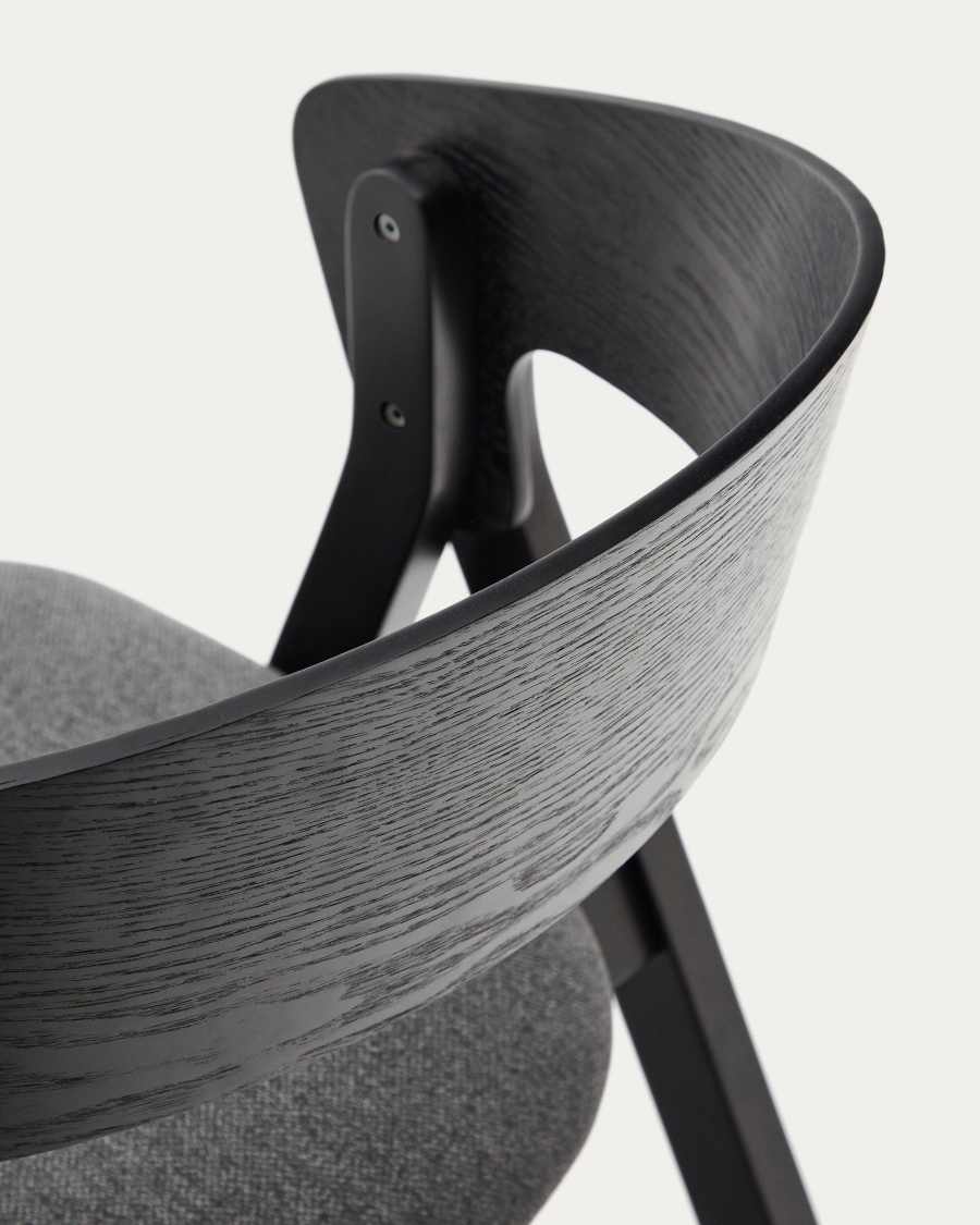 Godia chair in ash veneer with a black finish and grey chenille