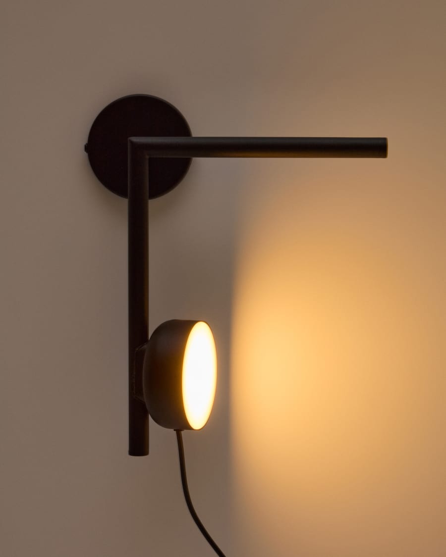 Orey black metal wall-mounted light fixture with multi-position spotlight