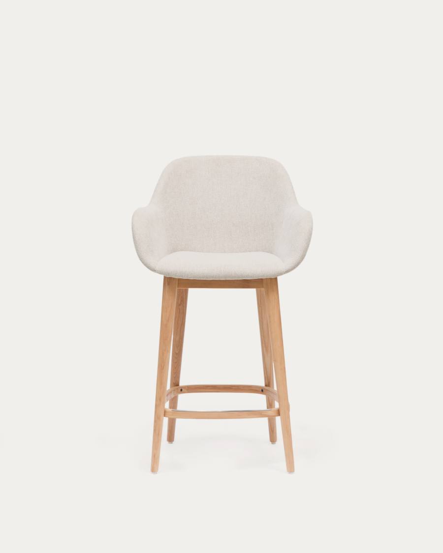 Konna stool in beige and solid ash wood legs in a light finish, 65 cm
