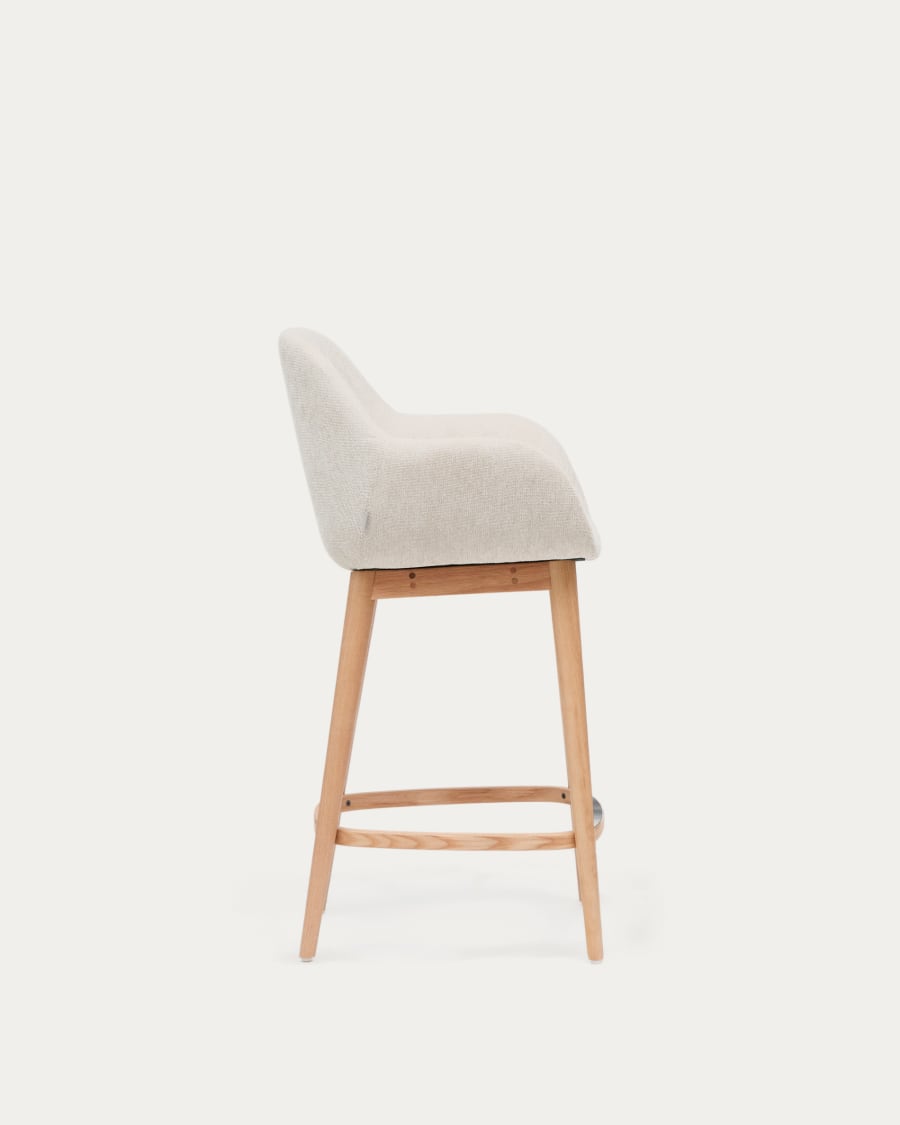 Konna stool in beige and solid ash wood legs in a light finish, 65 cm