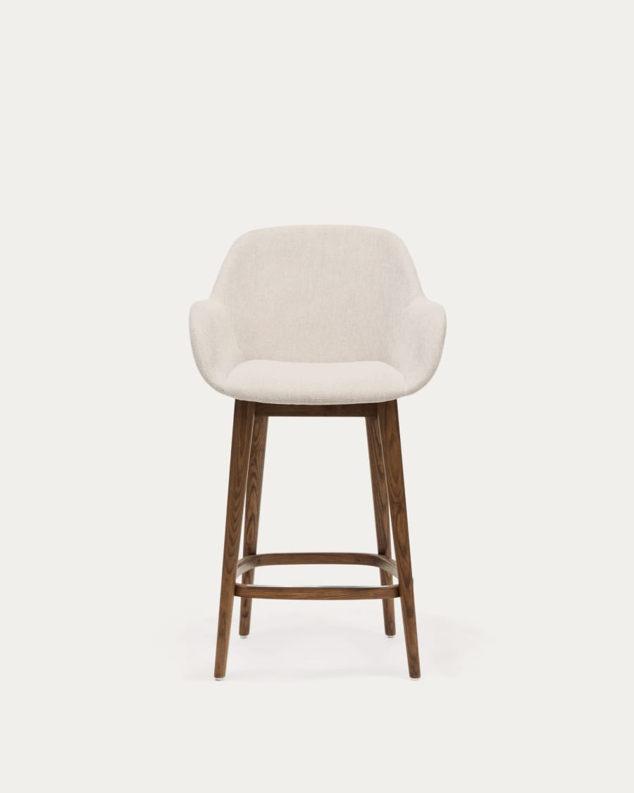 Konna stool in beige and solid ash wood legs in a dark finish, 65 cm