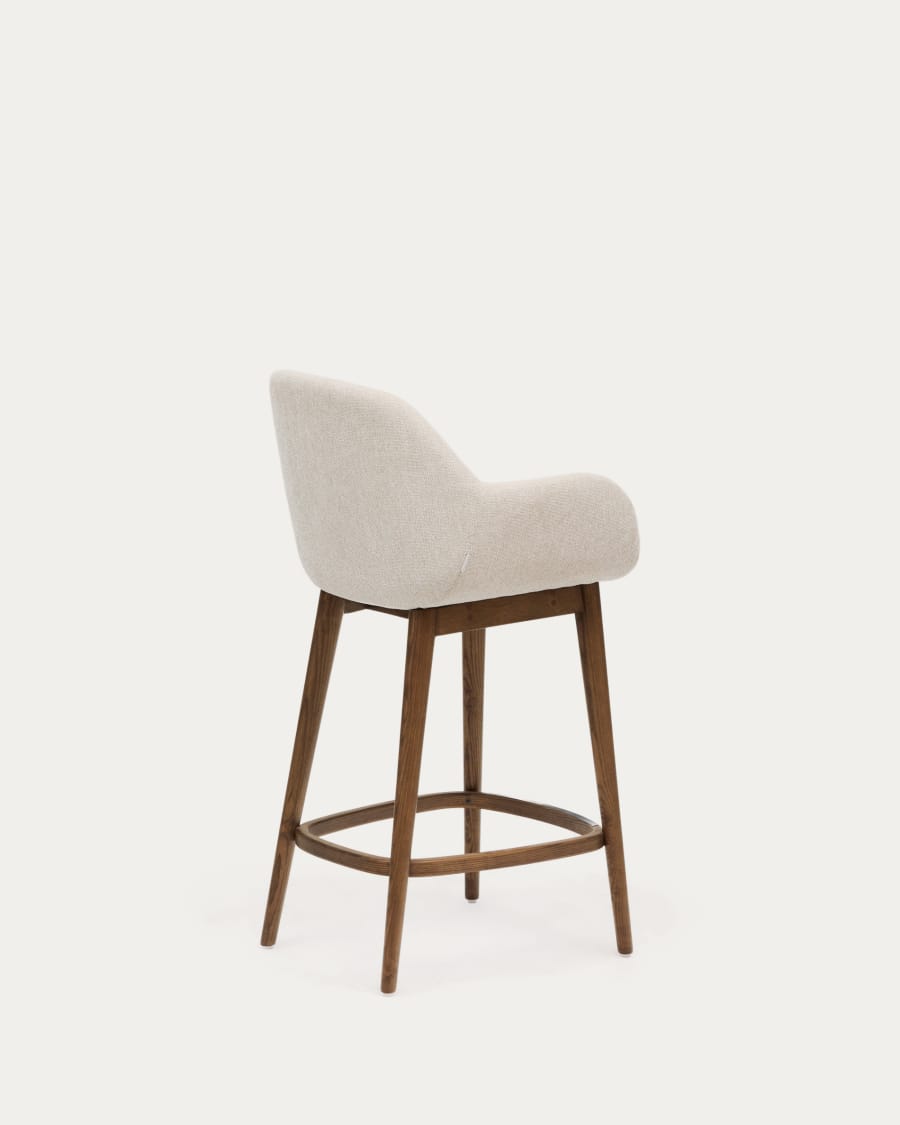 Konna stool in beige and solid ash wood legs in a dark finish, 65 cm