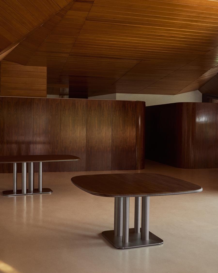 Melvar table made from walnut veneer and legs with brushed stainless steel base 150 x 150cm