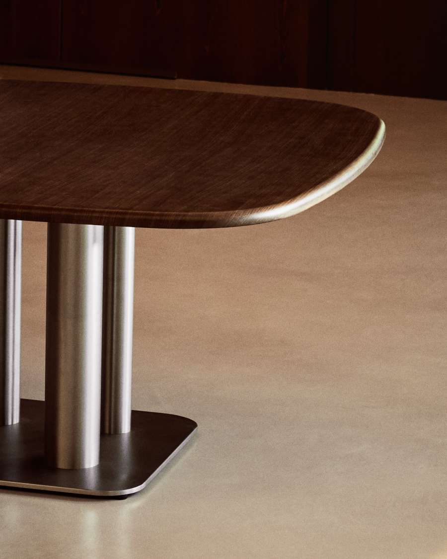 Melvar table made from walnut veneer and legs with brushed stainless steel base 150 x 150cm