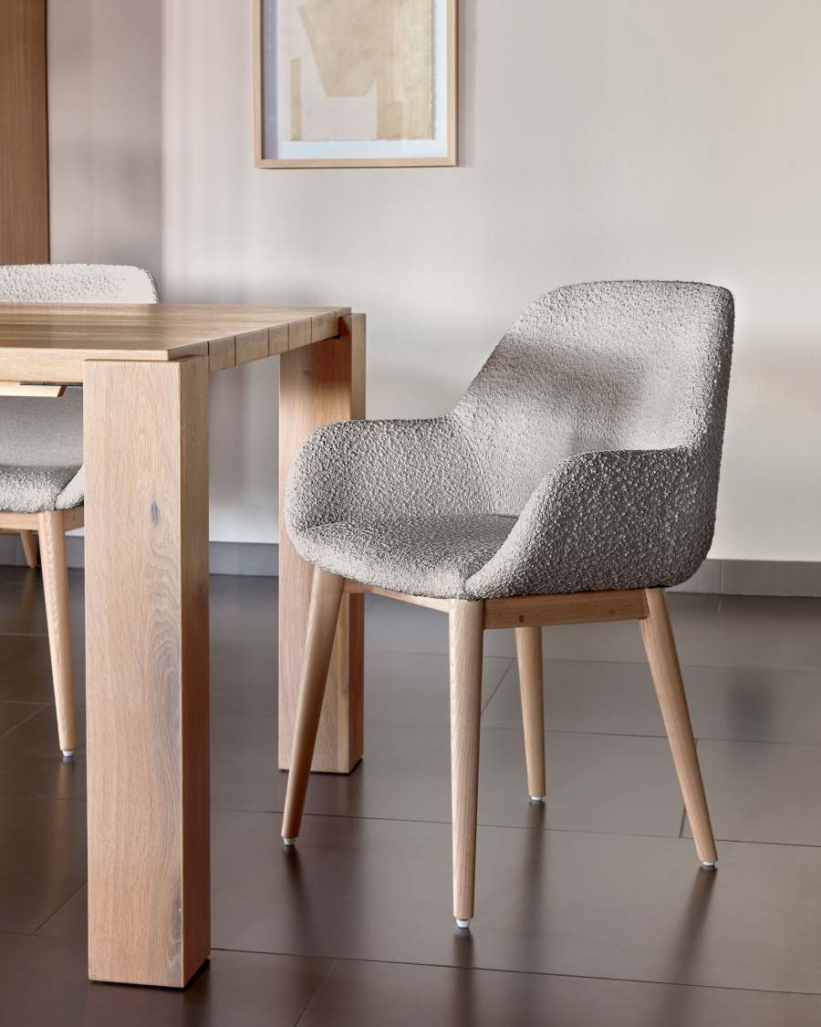 Konna chair in grey bouclé with solid ash wood legs in a natural finish
