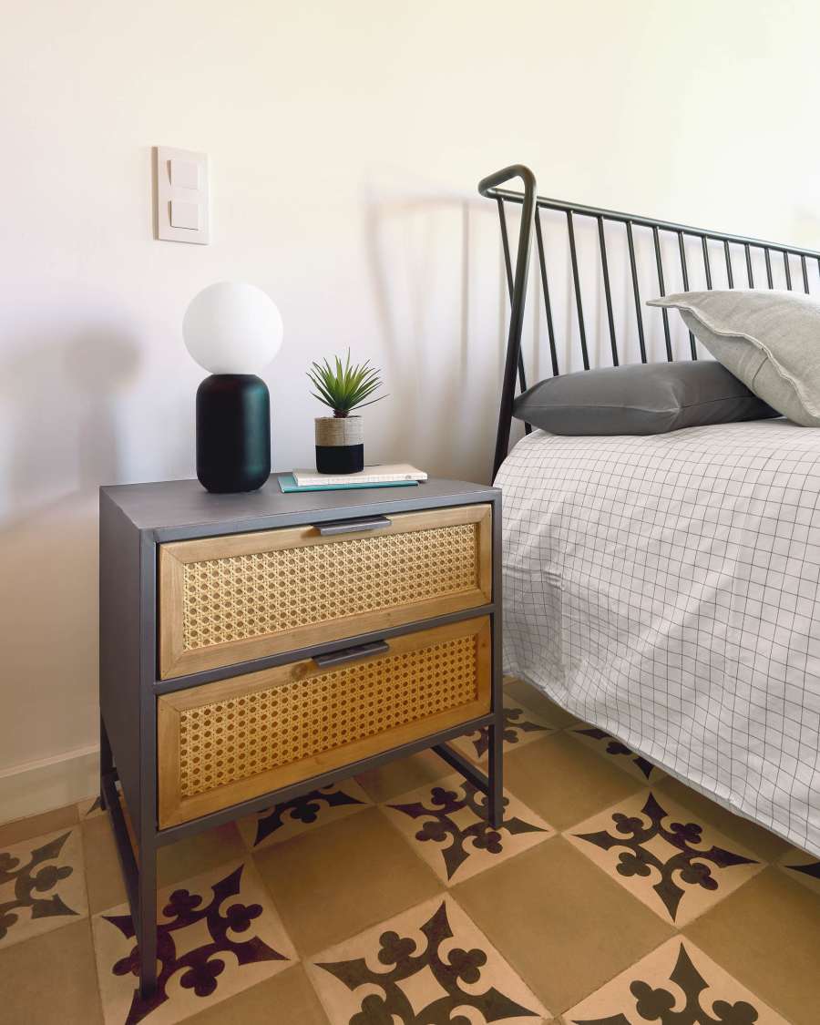 Kyoko bedside table made from solid fir wood with wicker and steel in black 50 x 51 cm
