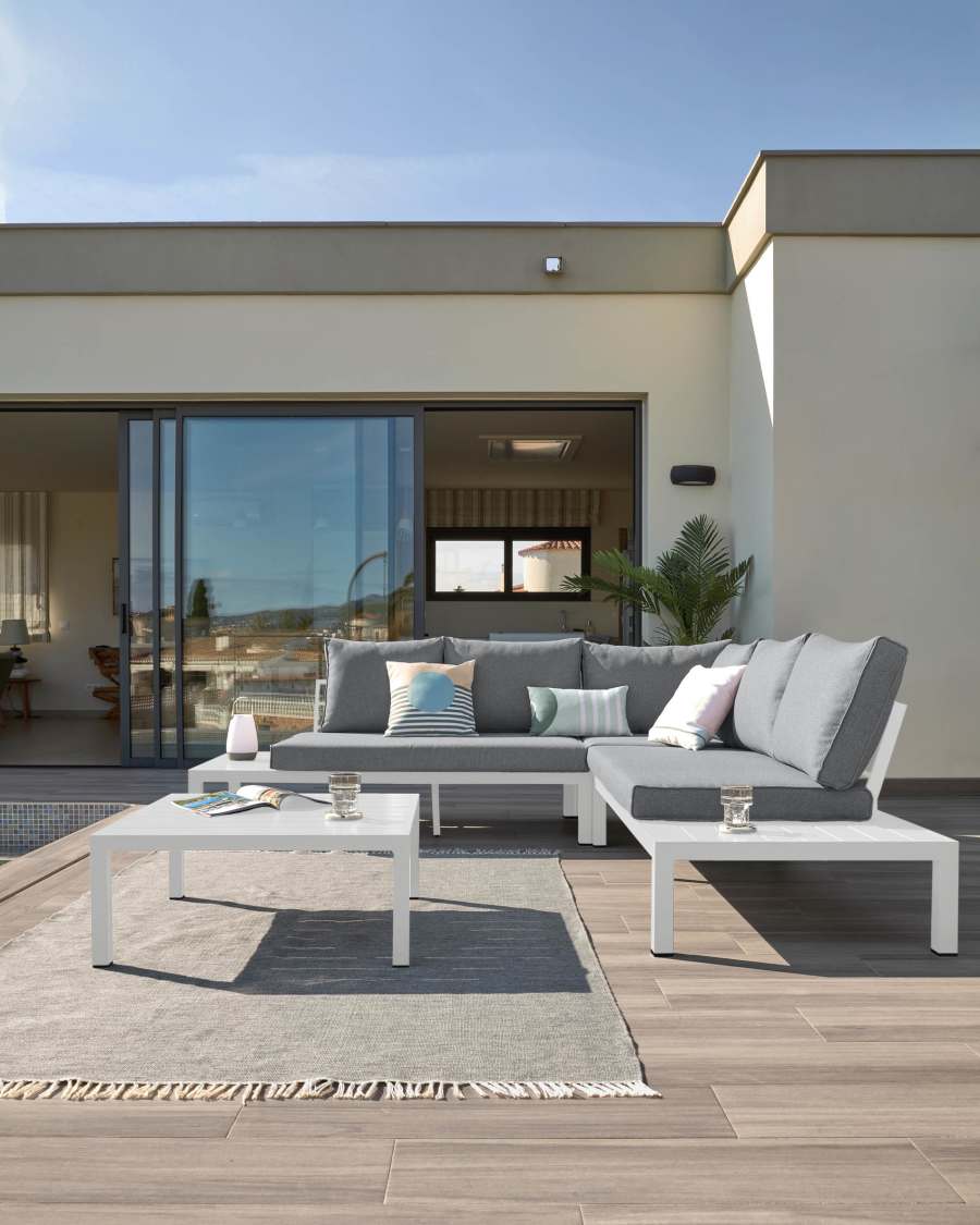 Duke outdoor set containing a 5-seater corner sofa and white aluminium table