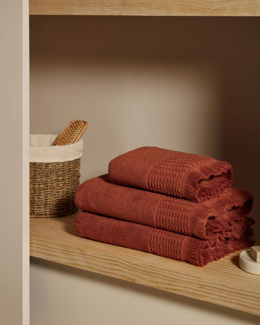 Veta 100% cotton face towel in terracotta, 30 x 50 cm