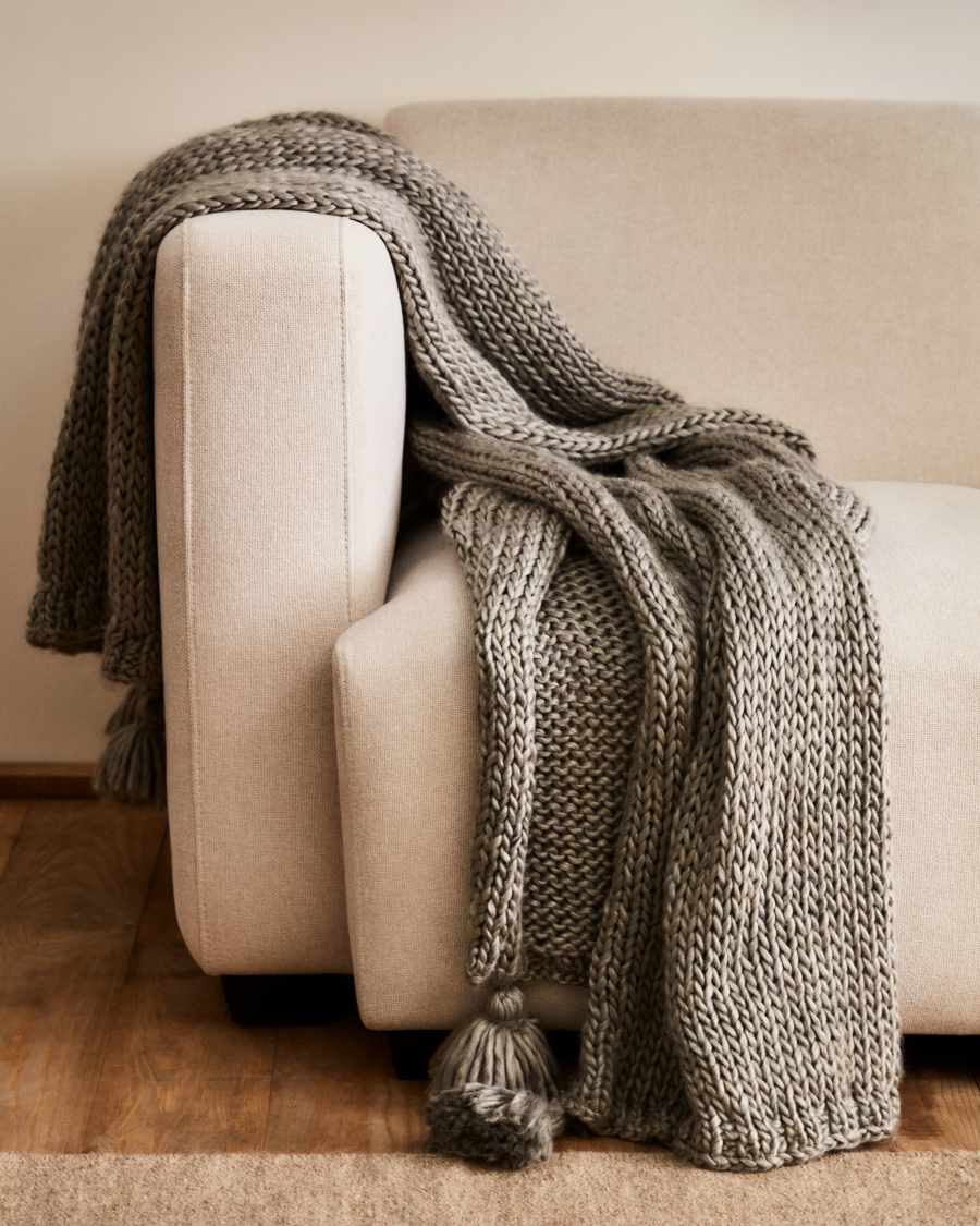 Jandra blanket with tassel pom poms in grey wool, 125 x 150 cm