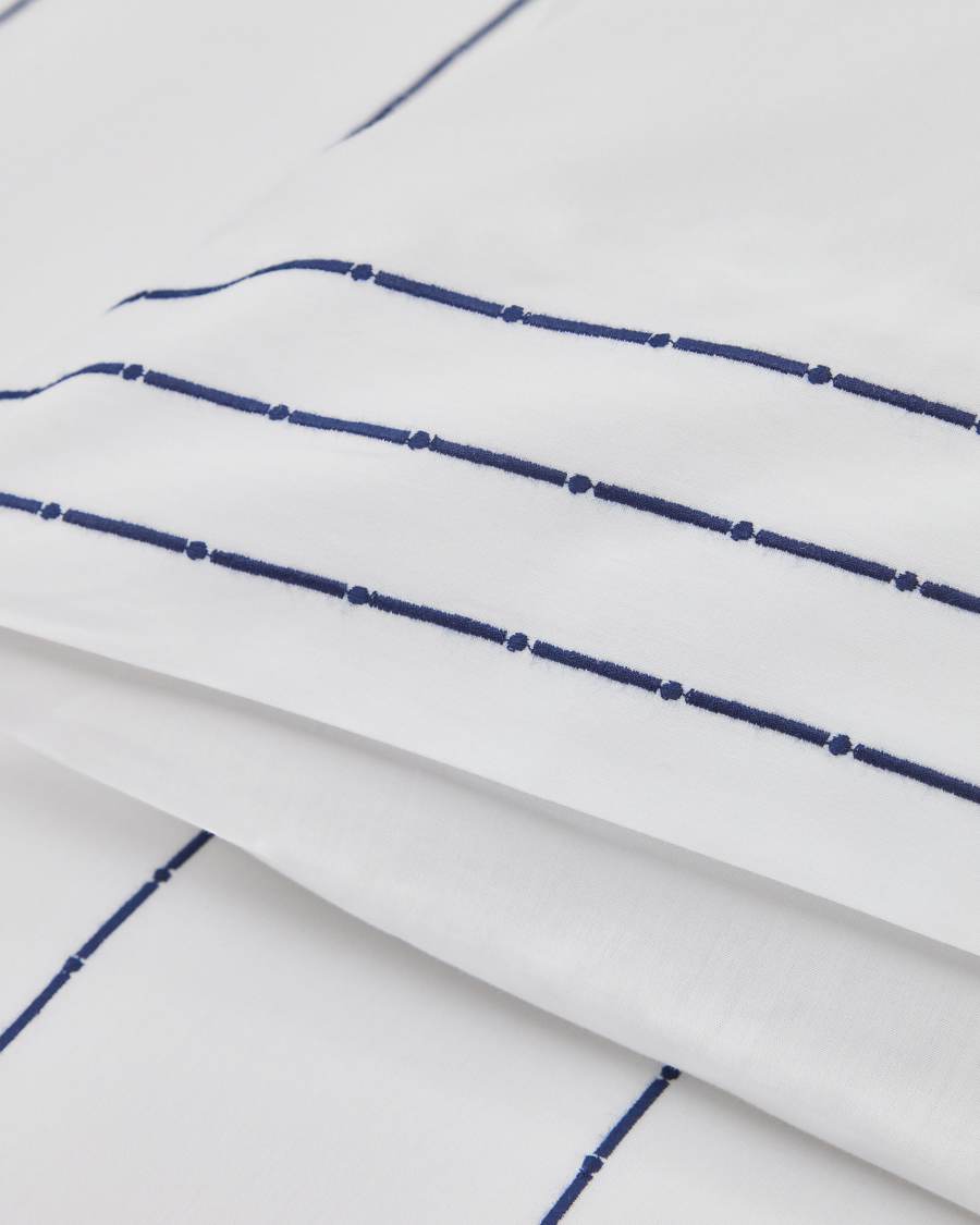 Cintia cotton percale duvet cover and pillowcase set in white with striped embroidery, 90 x 190 cm
