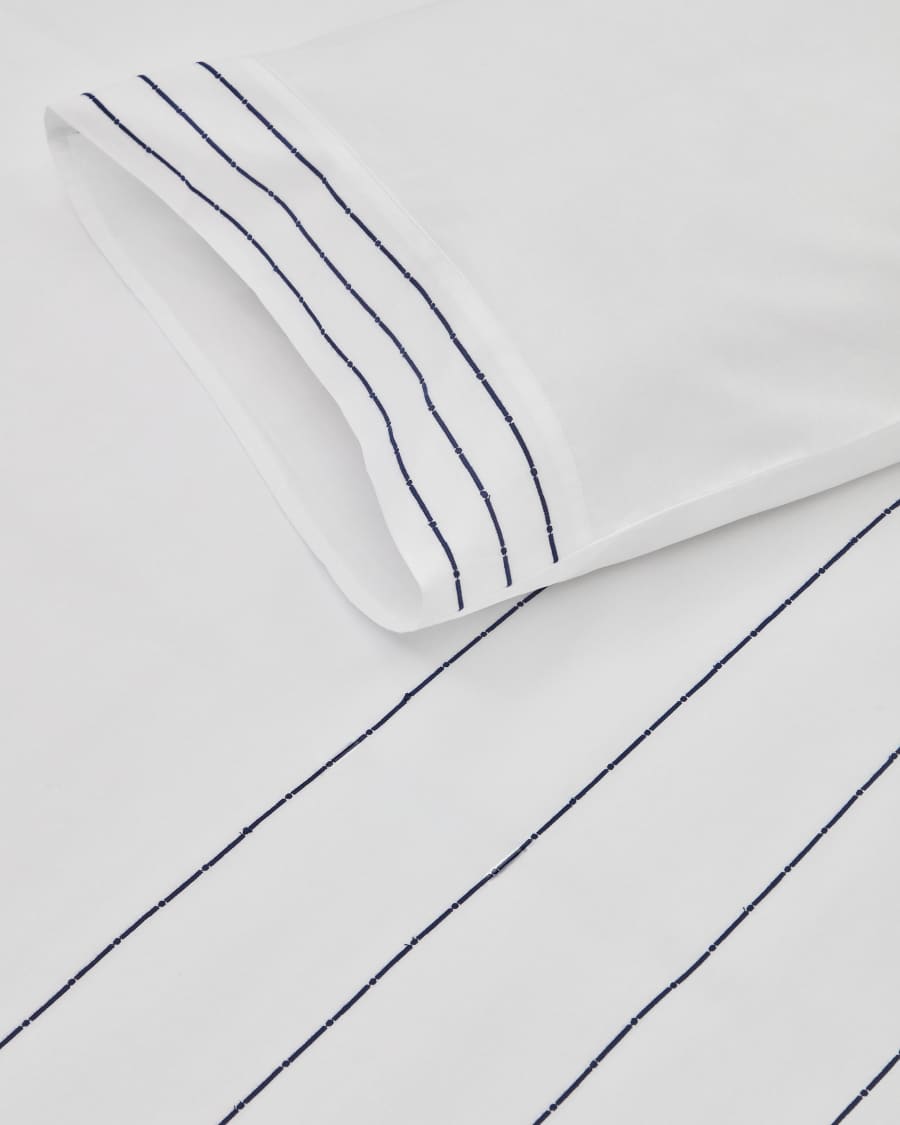 Cintia cotton percale duvet cover and pillowcase set in white with striped embroidery, 90 x 190 cm