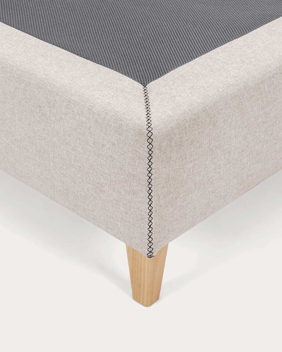 Nikos tall bed base in beige with solid beech wood legs for a 160 x 200 cm mattress