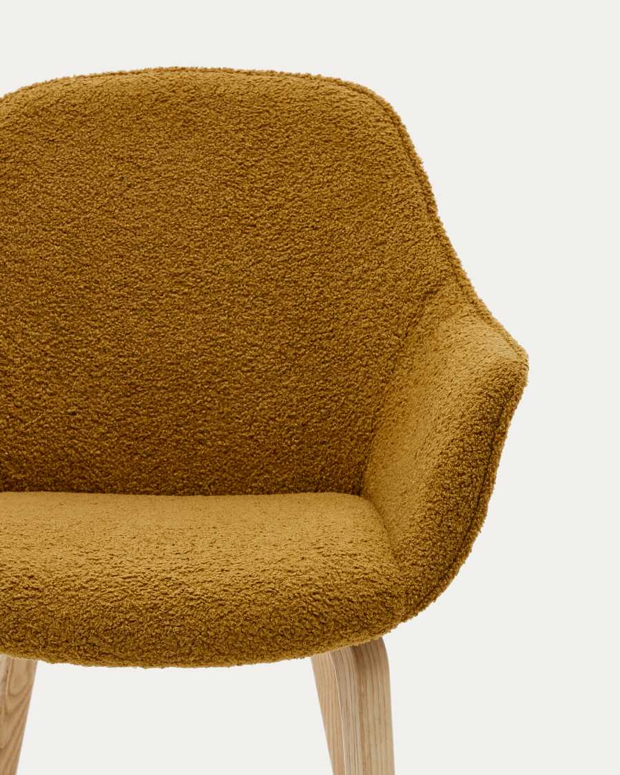 Aleli chair in mustard bouclé with solid ash wood legs and natural finish