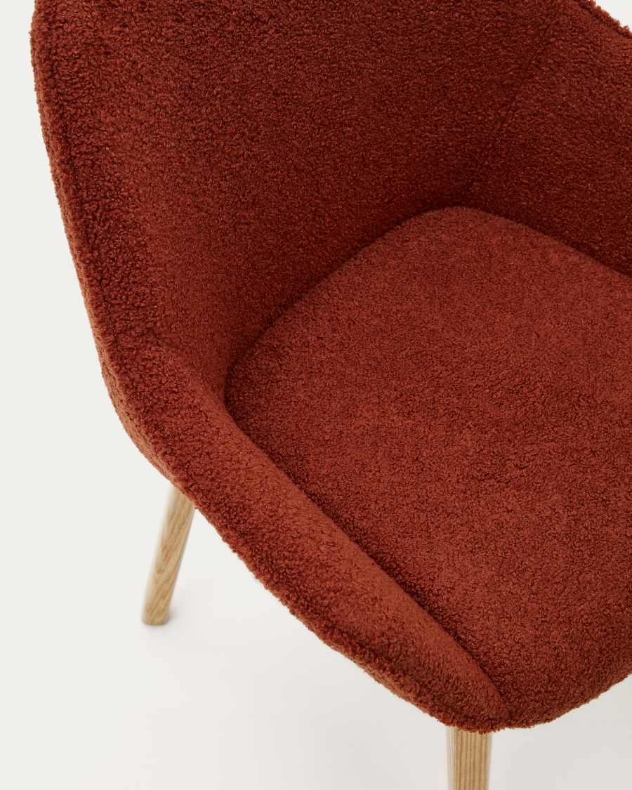 Aleli chair in terracota bouclé with solid ash wood legs and natural finish