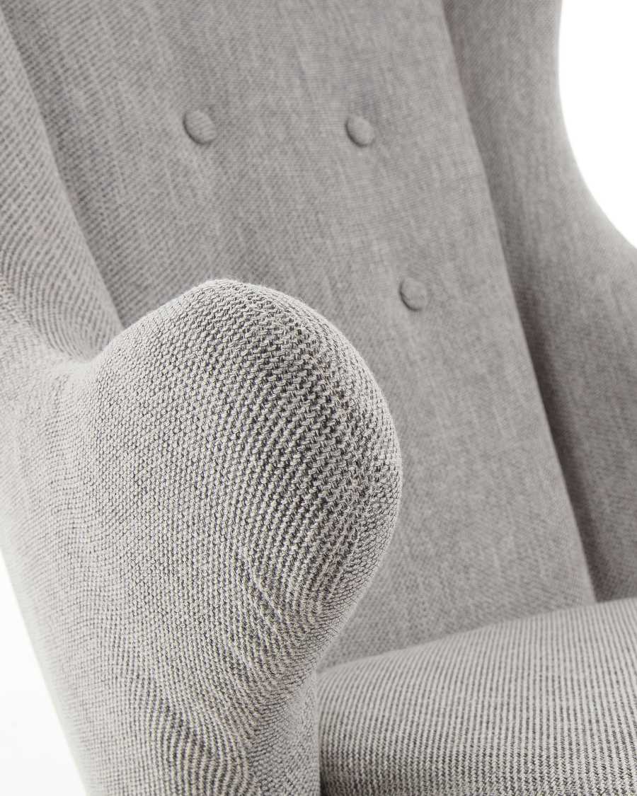 Meryl rocking chair in grey with steel legs and solid ash wood.