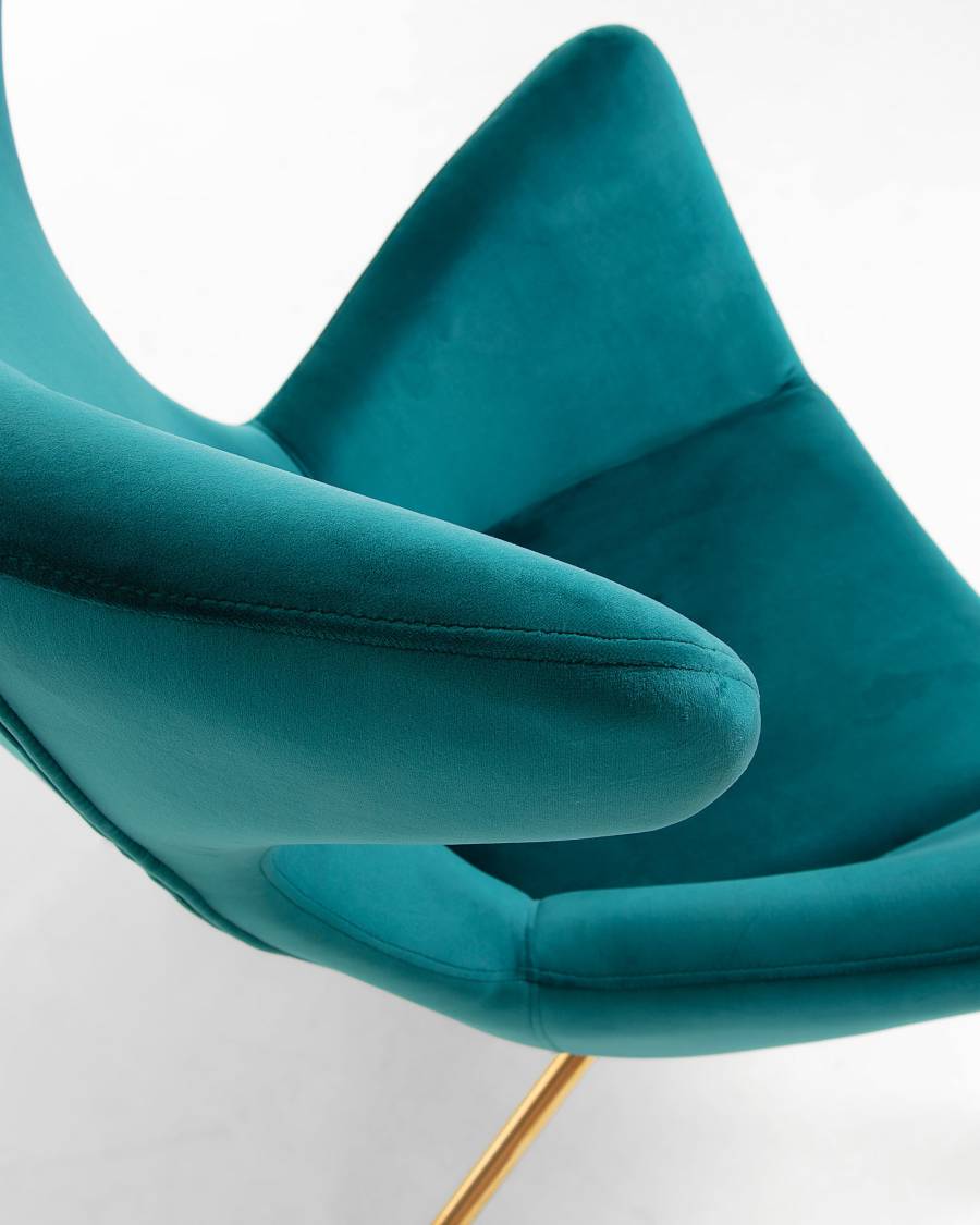 Chleo armchair in turquoise with legs in a gold finish