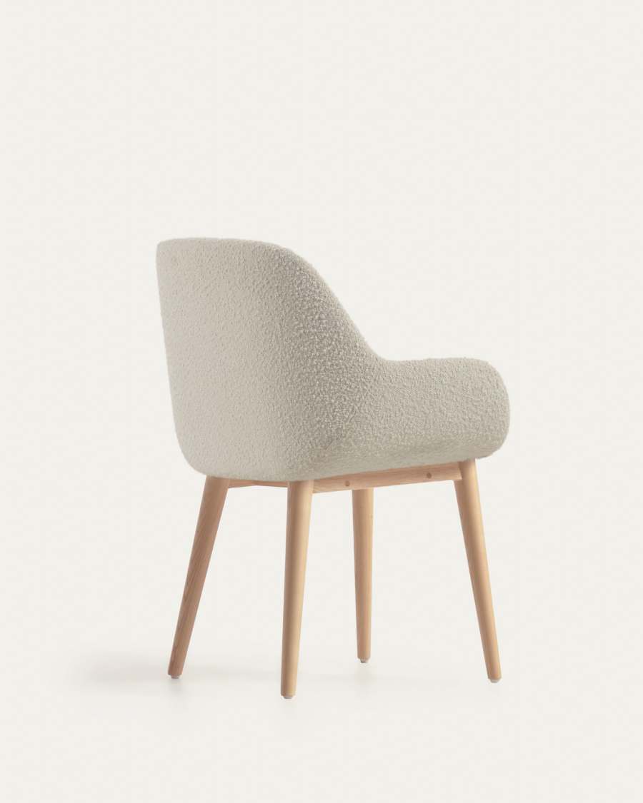 Konna chair in white bouclé with solid ash wood legs in a natural finish