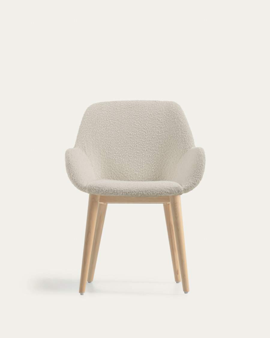 Konna chair in white bouclé with solid ash wood legs in a natural finish