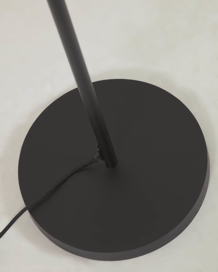 Francisca floor lamp metal with a glass and black finish.