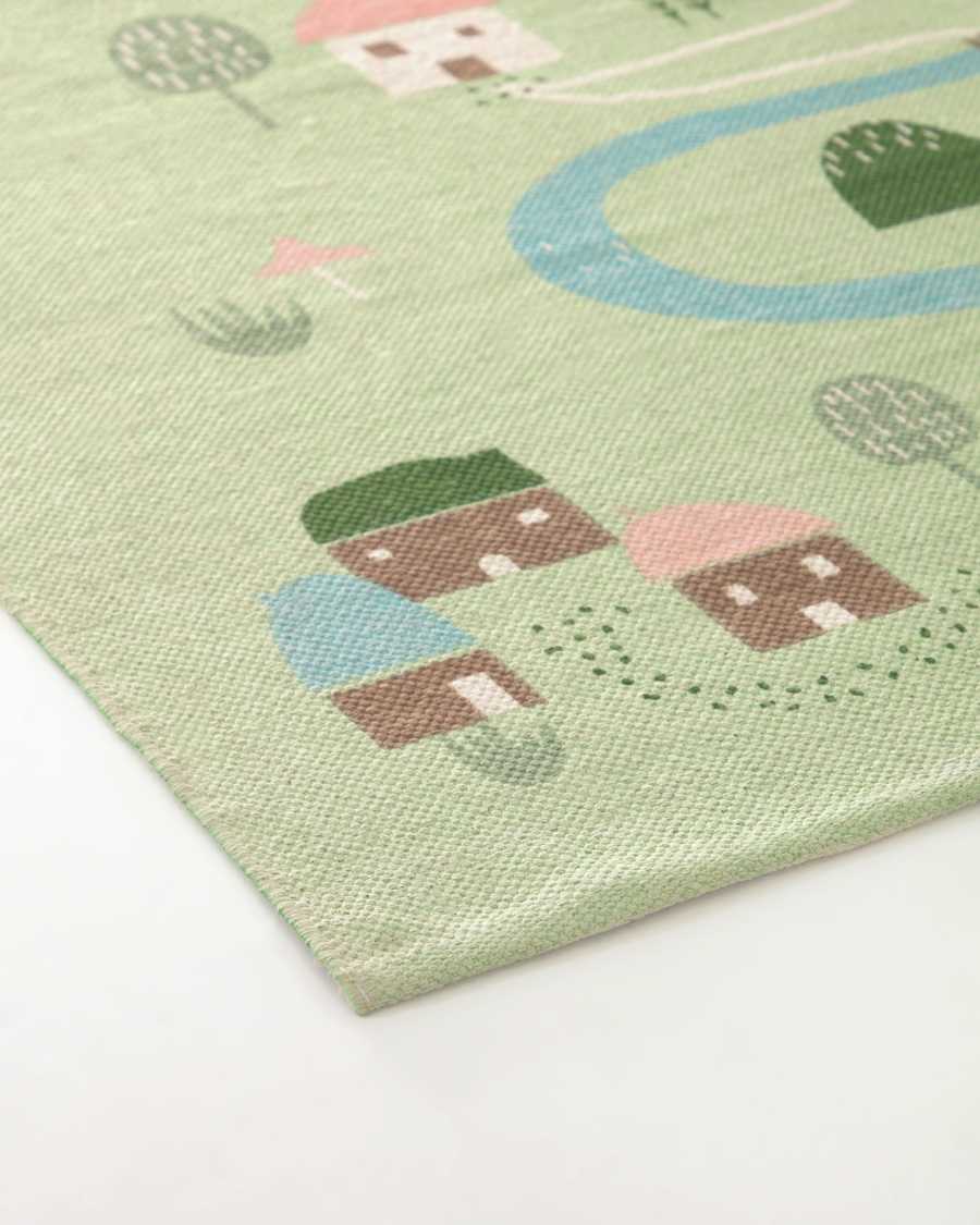Llaru 100% cotton rug in green with multi-coloured trees 90 x 130 cm