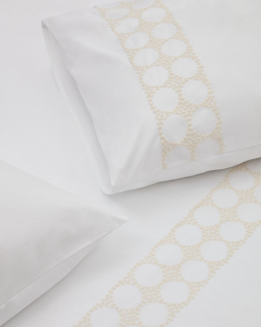 Teia cotton percale duvet cover and pillowcase set in white with floral embroidery, 150x200cm