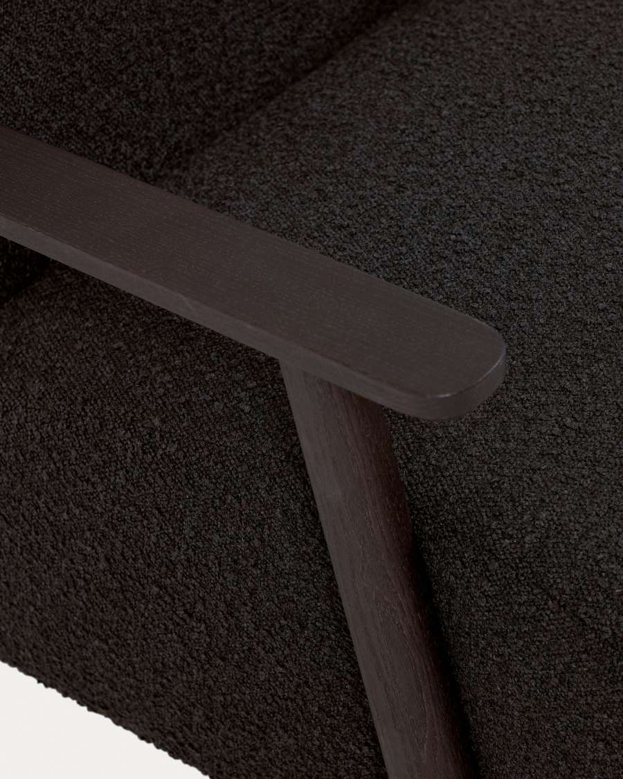 Meghan armchair in black bouclé with solid ash legs with wenge finish