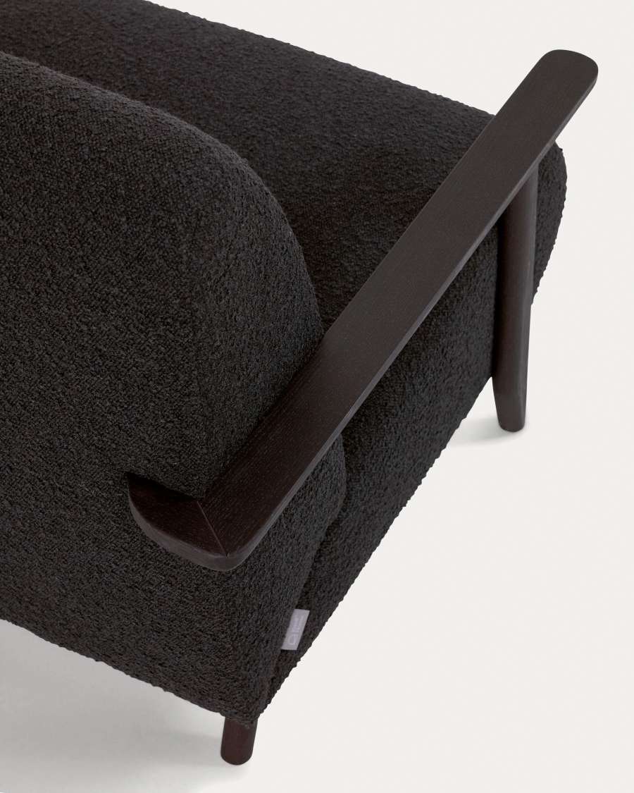 Meghan armchair in black bouclé with solid ash legs with wenge finish