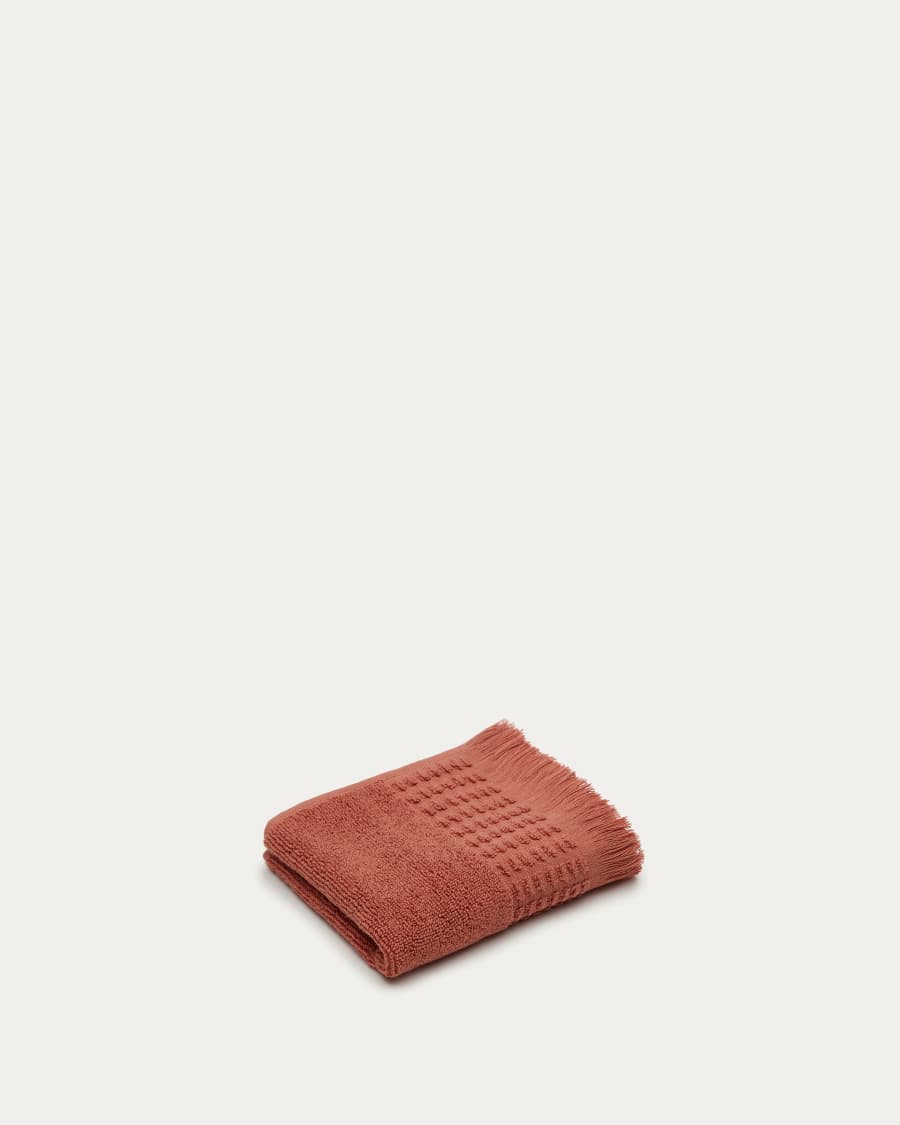 Veta 100% cotton face towel in terracotta, 30 x 50 cm