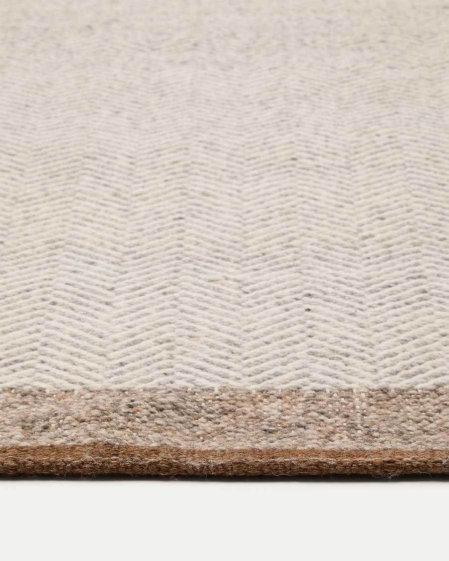 Tapis Nifelia jacquard en laine beige 200 x 300 cm