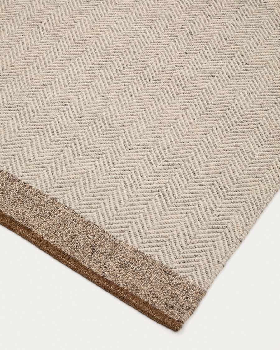 Tapis Nifelia jacquard en laine beige 200 x 300 cm