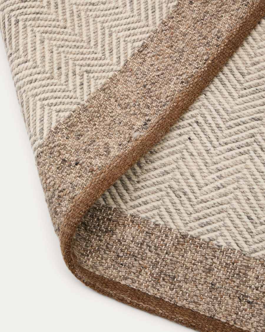 Tapis Nifelia jacquard en laine beige 200 x 300 cm