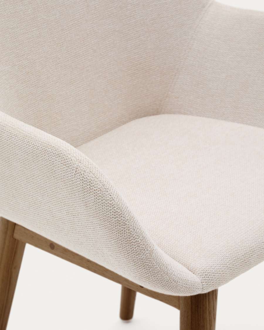 Konna chair in beige with solid ash wood legs in a dark finish