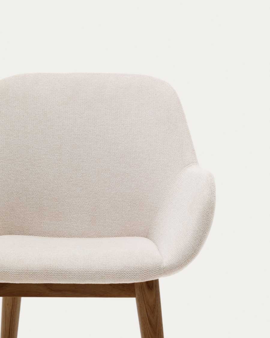 Konna chair in beige with solid ash wood legs in a dark finish