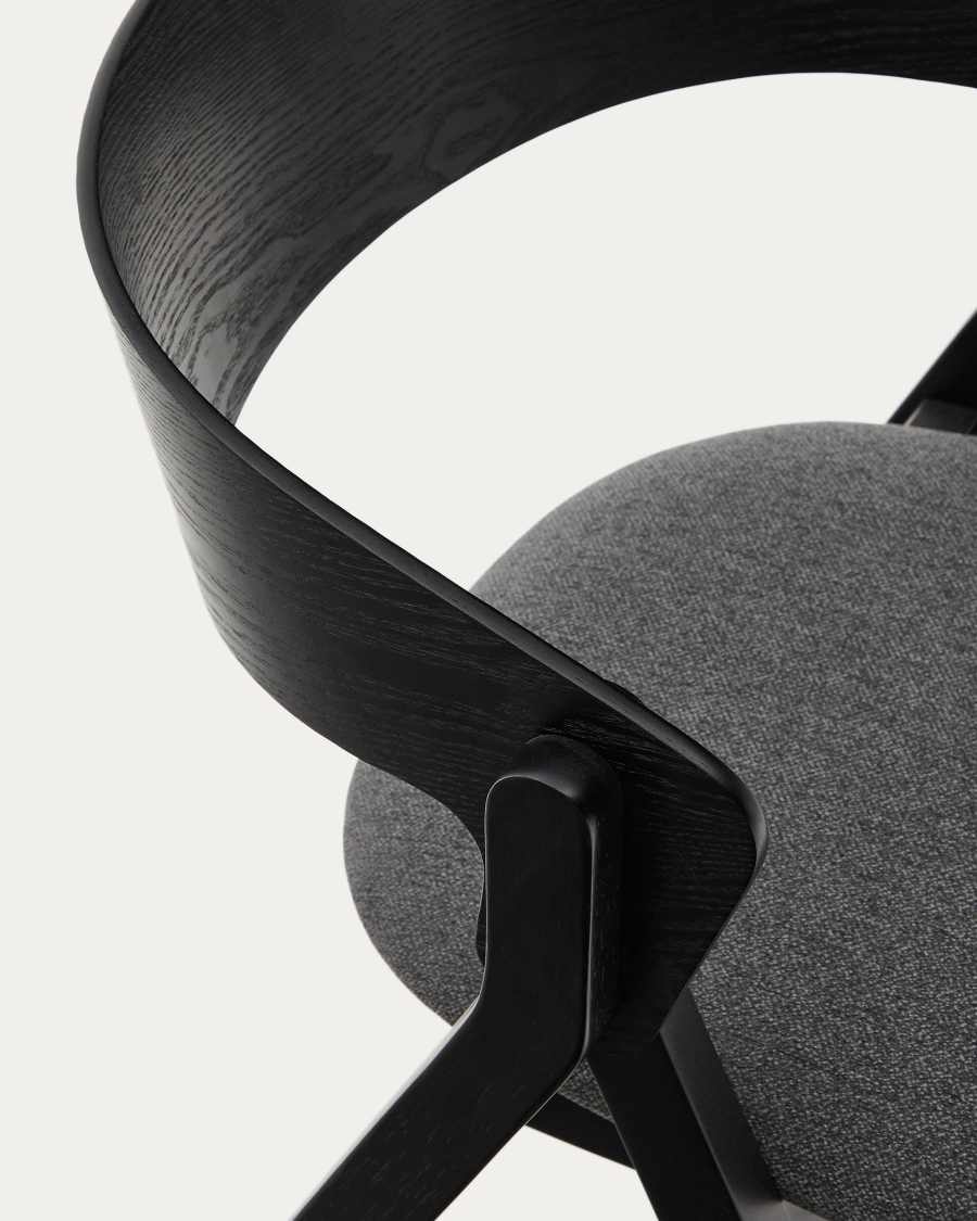 Godia chair in ash veneer with a black finish and grey chenille