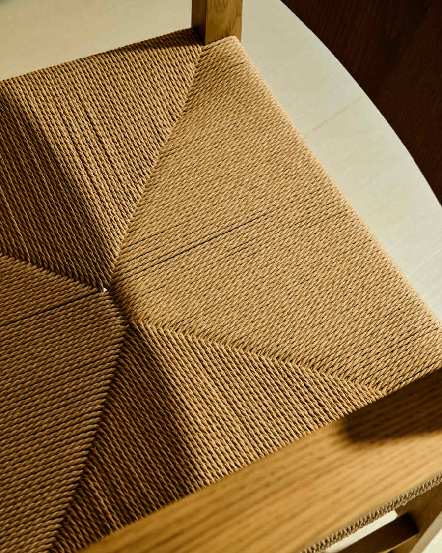 Idun chair made of FSC Mix Credit solid oak wood with natural tone finish and rope cord seat