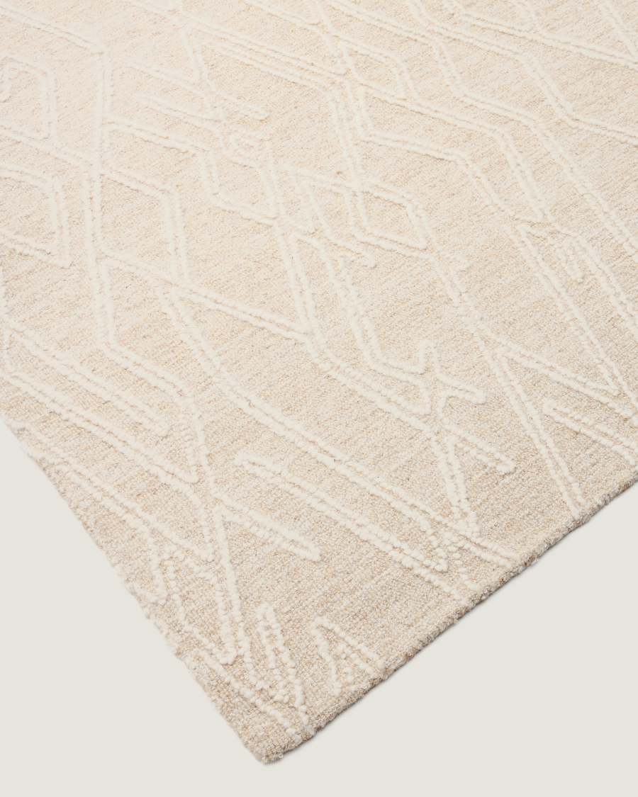 Selira beige wool rug with embroidered effect 300 x 200cm