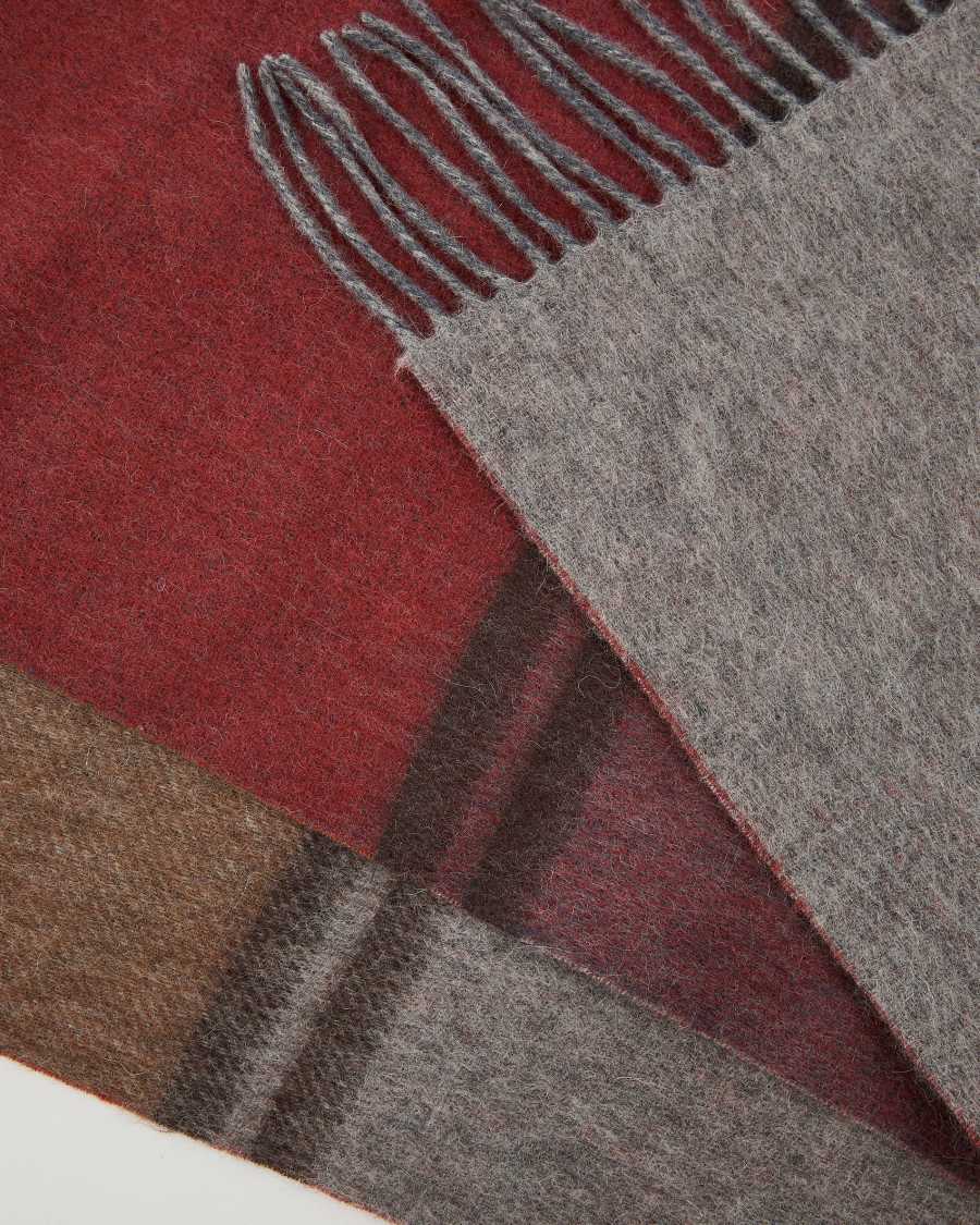 Manta Zunara barreja llana doble faç amb serrells multicolors 170x130 cm