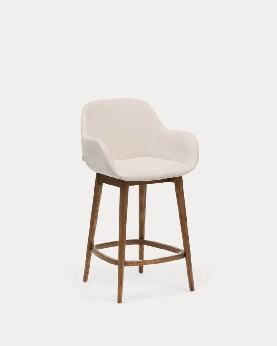 Konna stool in beige and solid ash wood legs in a dark finish, 65 cm